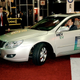 Illustration for article titled Detroit Auto Show: World Exclusive Surreal, Illegal Test Drive Of Chinese Hybrid Through Cobo Arena
